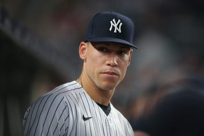 Yankees RF Aaron Judge looking on from dugout