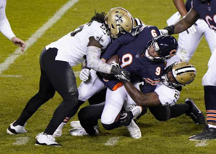 New Orleans linebacker Demario Davis (56) sacks Chicago quarterback Nick Foles (9). Mandatory Credit: Mike Dinovo-USA TODAY Sports