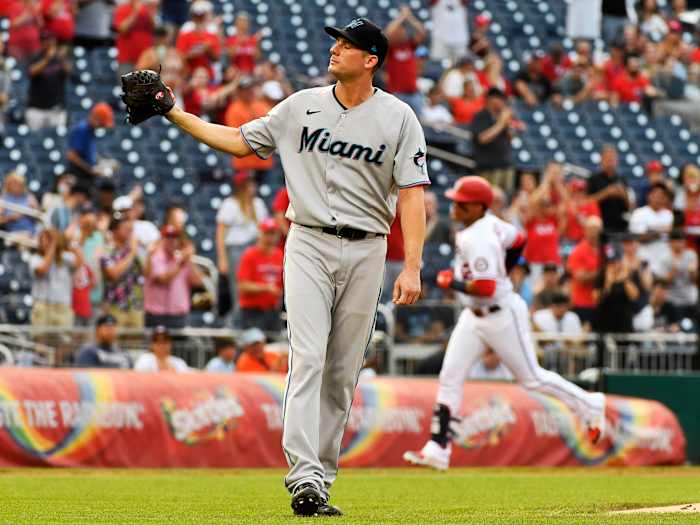 Jul 19, 2021; Washington, District of Columbia, USA; Miami Marlins relief pitcher Ross Detwiler (54) reacts after giving up a two run home run to Washington Nationals left fielder Juan Soto (22) at Nationals Park.