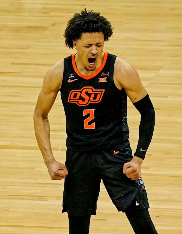 Oklahoma State Cowboys guard Cade Cunningham reacts after scoring against the Texas Longhorns