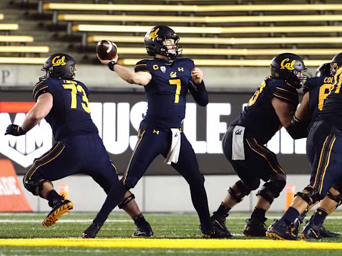 Chase Garbers throws the ball from the pocket against the Oregon Ducks during a home game in Berkeley.