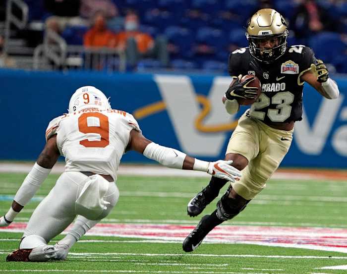 Broussard carries the ball against the Texas Longhorns in the Valero Alamo Bowl.