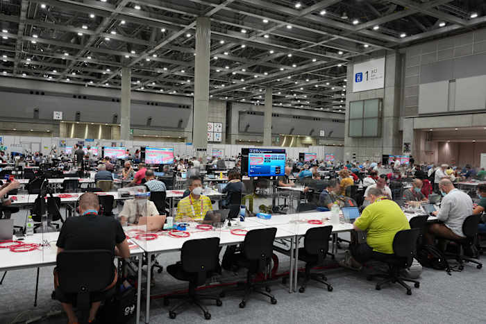 The press and photographers' workroom at the Main Press Center in Tokyo.
