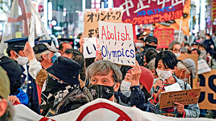 Anti-Olympic demonstrators took to the streets of Tokyo in March after the torch relay began.undefined