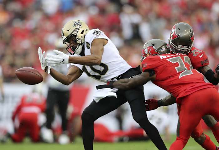 Tampa Bay safety Jordan Whitehead (31) knocks the ball away from Saints receiver Tre'Quan Smith (10). Mandatory Credit: Kevin Jairaj-USA TODAY Sports