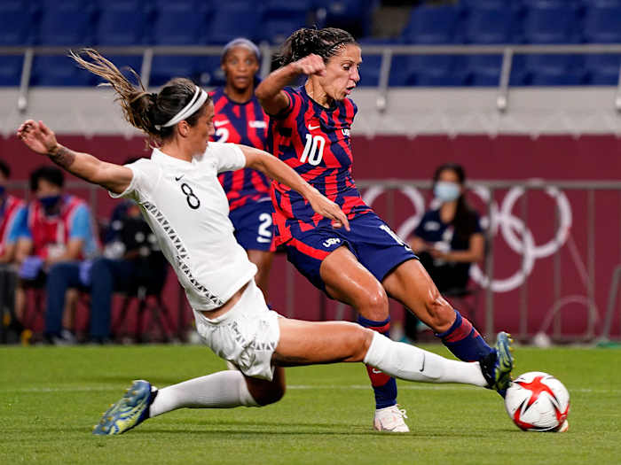 Carli Lloyd dribbles vs. New Zealand