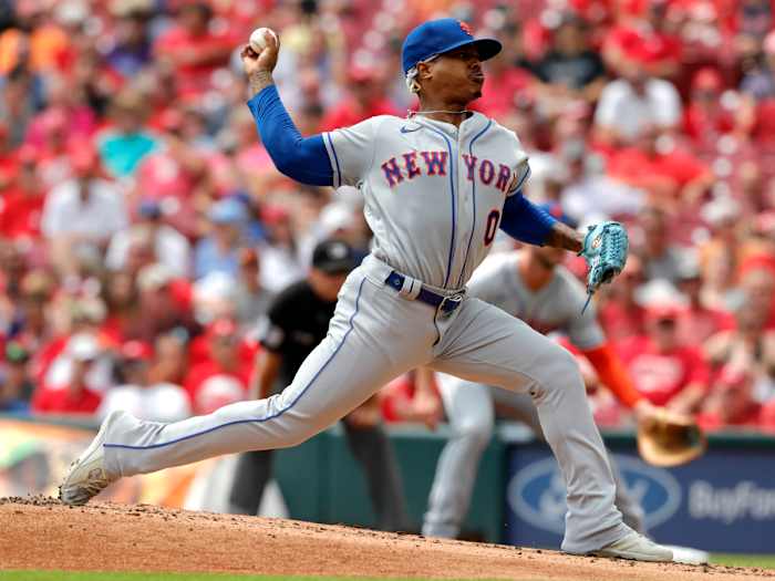 Jul 21, 2021; Cincinnati, Ohio, USA; New York Mets starting pitcher Marcus Stroman (0) throws a pitch against the Cincinnati Reds in the first inning at Great American Ball Park.