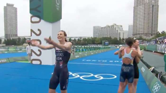 Team USA triathlete Katie Zaferes celebrates after winning bronze at the Tokyo Olympics