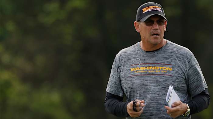 Jun 10, 2021; Ashburn, VA, USA; Washington Football Team head coach Ron Rivera stands on the field during drills as part of minicamp at Inova Sports Performance Center.