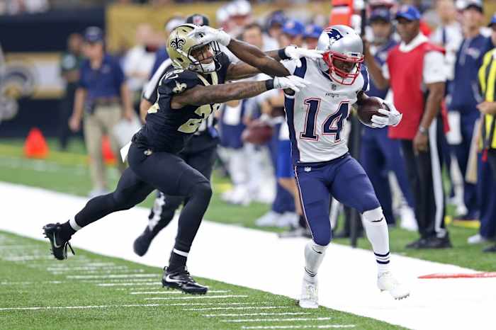 New Orleans cornerback P.J. Williams (26) knocks Patriots receiver Brandin Cooks (14) out of bounds after a catch. Mandatory Credit: Chuck Cook-USA TODAY Sports