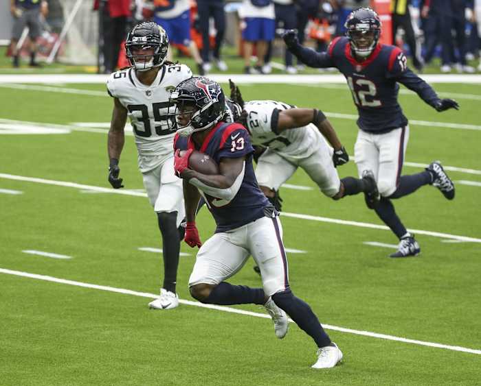 Houston Texans receiver Brandin Cooks (13) runs after a reception and scores a touchdown against Jacksonville. Mandatory Credit: Troy Taormina-USA TODAY Sports