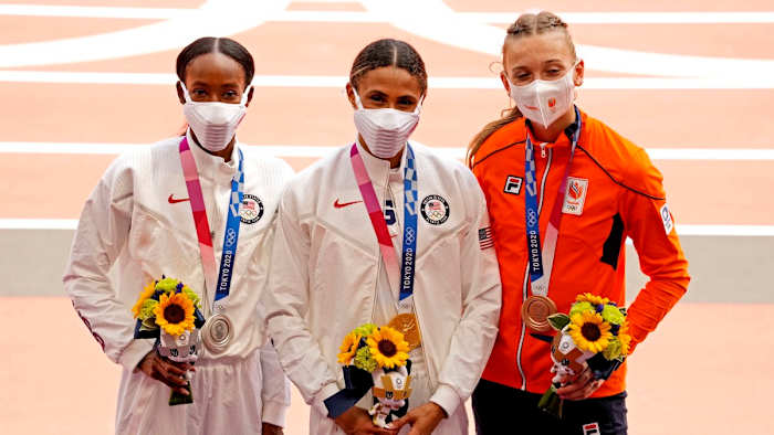 Dalilah Muhammad (USA) celebrates winning the silver medal, Sydney McLaughlin (USA) celebrates winning the gold medal and Femke Bol (NED) celebrates winning the bronze medal during the Tokyo 2020 Olympic Games