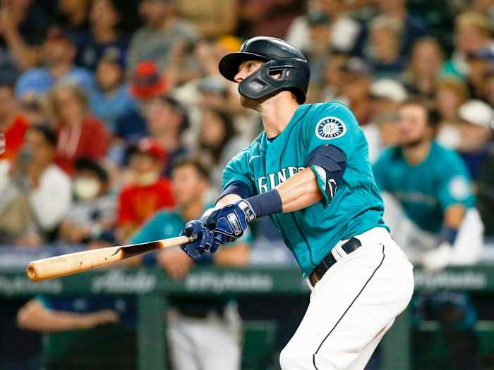 Jul 9, 2021; Seattle, Washington, USA; Seattle Mariners designated hitter Mitch Haniger (17) watches his grand slam home run against the Los Angeles Angels during the eighth inning at T-Mobile Park.