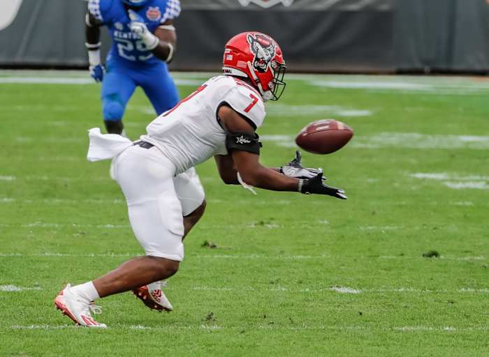 Jan 2, 2021; Jacksonville, FL, USA; North Carolina State Wolfpack running back Zonovan Knight (7) catches the ball against the Kentucky Wildcats during the second half at TIAA Bank Field.