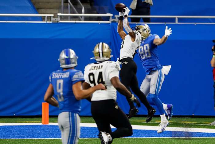 New Orleans Saints cornerback Patrick Robinson intercepts the pass intended for Detroit Lions tight end T.J. Hockenson. © Junfu Han via Imagn Content Services, LLC