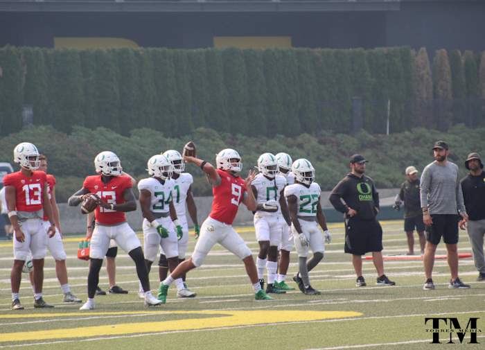 Anthony Brown and Jay Butterfield get some throws in during fall camp.