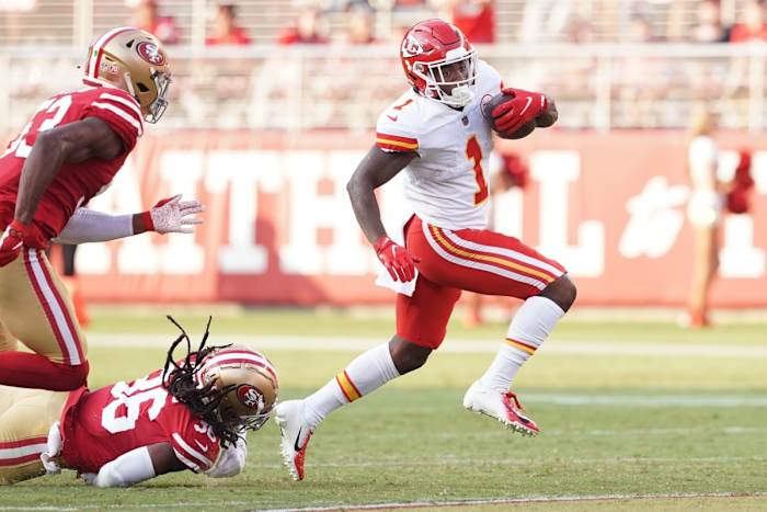 Aug 14, 2021; Santa Clara, California, USA; Kansas City Chiefs running back Jerick McKinnon (1) eludes a tackle by San Francisco 49ers defensive back Marcell Harris (36) during the second quarter at Levi's Stadium. Mandatory Credit: Darren Yamashita-USA TODAY Sports