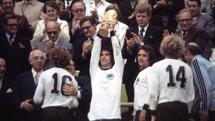 Gerd Muller lifts the World Cup trophy in 1974