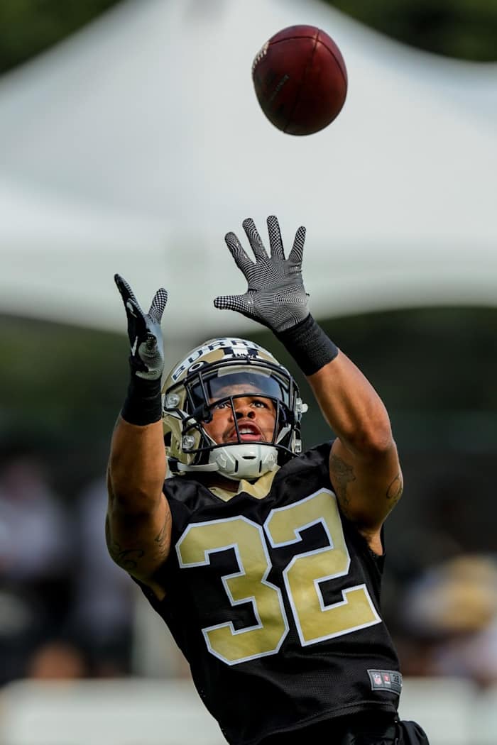 New Orleans Saints safety Eric Burrell (32) performs drills during a training camp session. Mandatory Credit: Stephen Lew-USA TODAY Sports