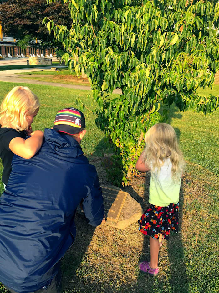 The author, with his daughters, remembering old friends.