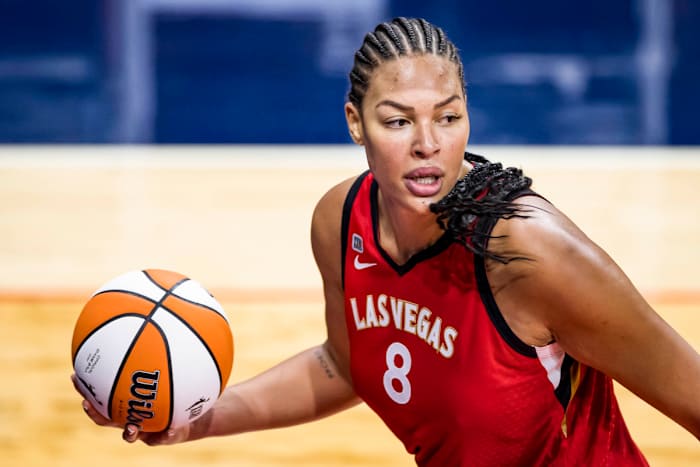Liz Cambage palms the basketball