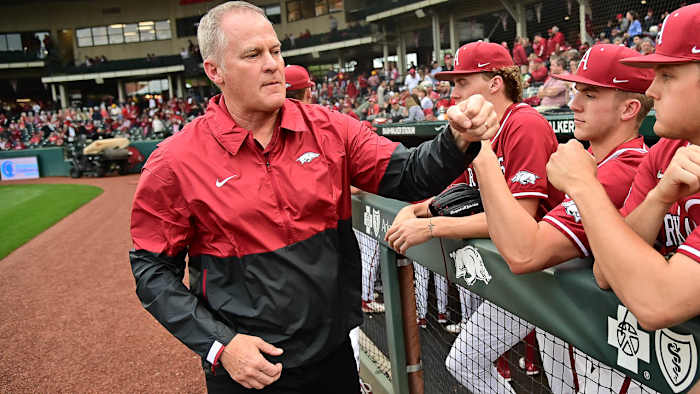 Arkansas athletics director Hunter Yurachek interacts with the Razorback baseball team.