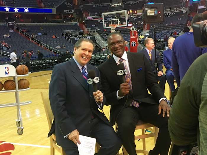 Bob Rathbun poses for a picture with Dominique Wilkins.