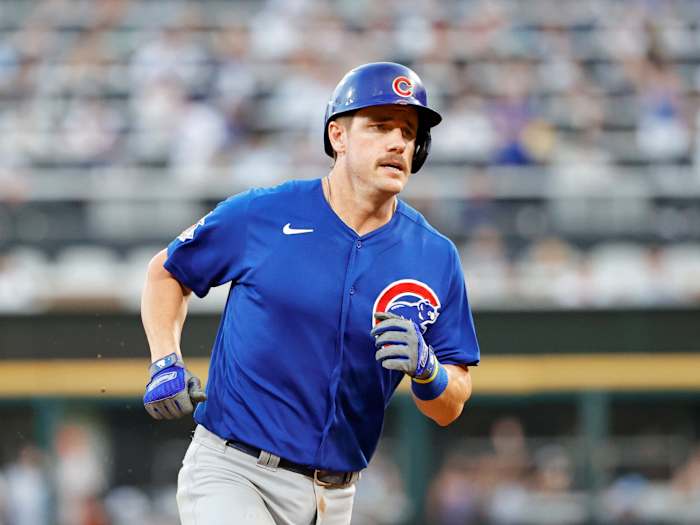Aug 28, 2021; Chicago, Illinois, USA; Chicago Cubs third baseman Patrick Wisdom (16) rounds the bases after hitting a solo home run against the Chicago White Sox during the fourth inning at Guaranteed Rate Field.