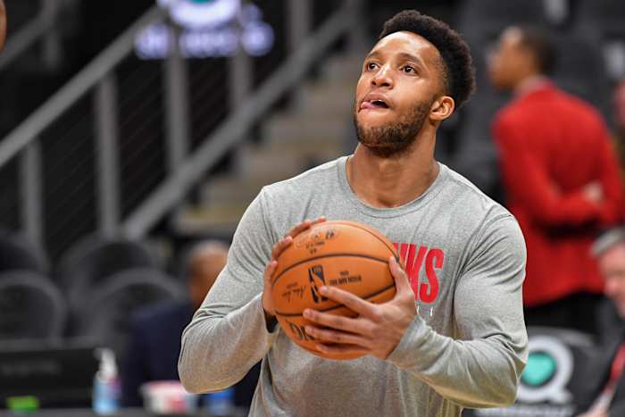 Atlanta Hawks guard Evan Turner warms up before a game against the Boston Celtics
