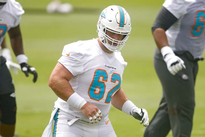 Jun 16, 2021; Miami Gardens, FL, USA; Miami Dolphins center Matt Skura (62) works out during minicamp at Baptist Health Training Facility.