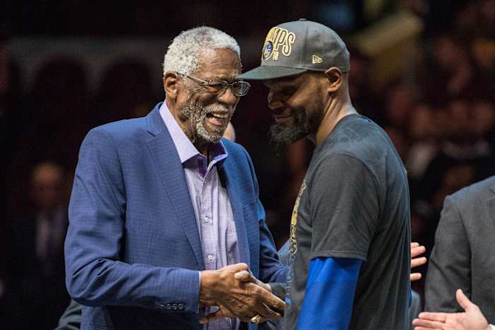 Golden State Warriors forward Kevin Durant talks with Bill Russell after winning the Bill Russell NBA Finals Most Valuable Player Award after beating the Cleveland Cavaliers in the 2018 NBA Finals