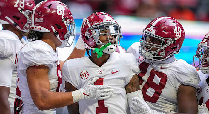 Alabama's Jameson Williams reacts after he scored a touchdown vs Miami