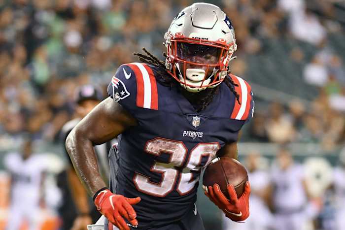 Rhamondre Stevenson goes to the Patriots in SI's re-draft of the 2021 NFL draft.