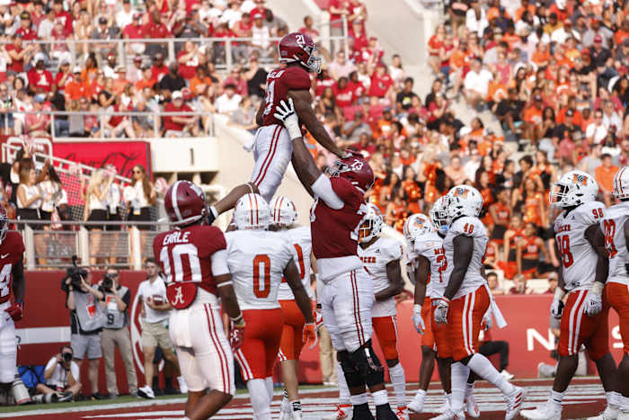 Jase McClellan and Evan Neal celebrate against Mercer