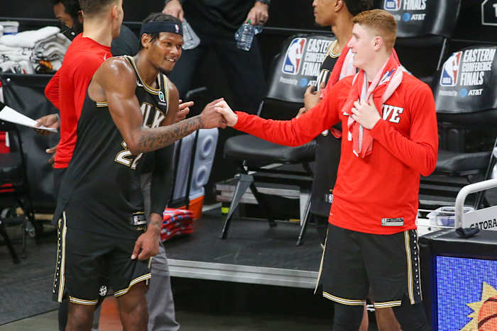 Atlanta Hawks forward Cam Reddish (22) celebrates with guard Kevin Huerter
