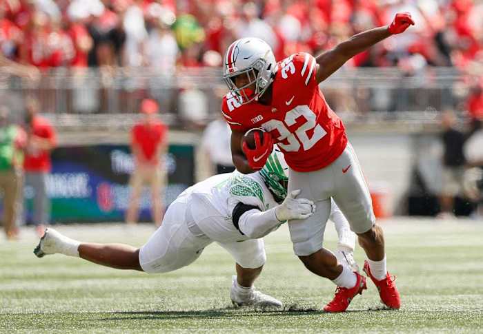 An exciting freshman runner, TreVeyon Henderson has been an early-season star for the Buckeyes.
