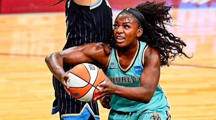 Michaela Onyenwere drives to the basket