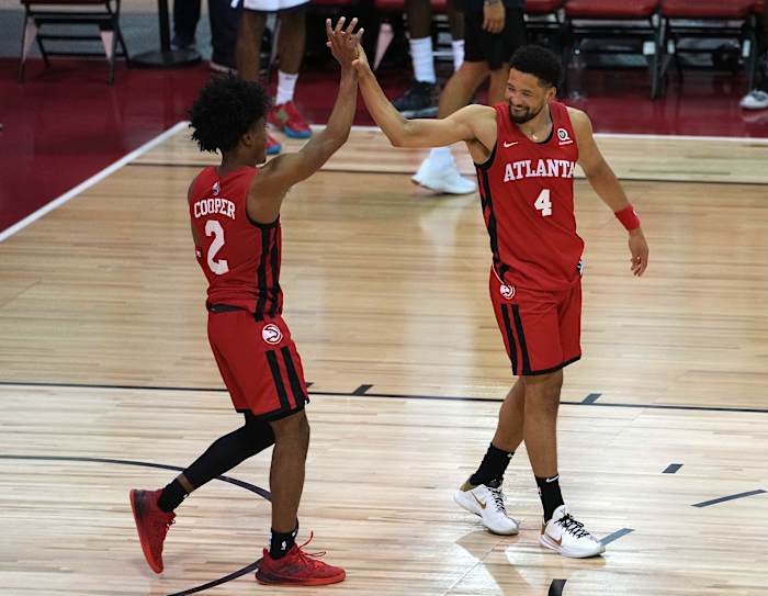 Atlanta Hawks guard Sharife Cooper (2) celebrates with guard Skylar Mays (4) after scoring the game winning basket against the Indiana Pacers to give the Hawks a 84-83 victory during an NBA Summer League game at Cox Pavilion.