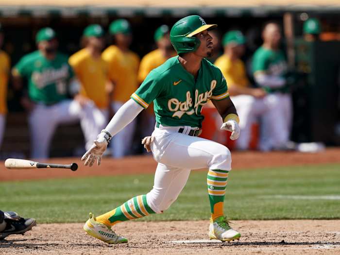 Aug 28, 2021; Oakland, California, USA; Oakland Athletics second baseman Tony Kemp (5) hits a double during the seventh inning against the New York Yankees at RingCentral Coliseum.