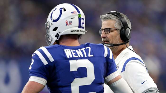 Indianapolis Colts quarterback Carson Wentz (2) talks with head coach Frank Reich on Sunday, Sept. 12, 2021, during the regular season opener against the Seattle Seahawks at Lucas Oil Stadium in Indianapolis