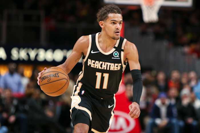 Atlanta Hawks guard Trae Young (11) dribbles against the Miami Heat