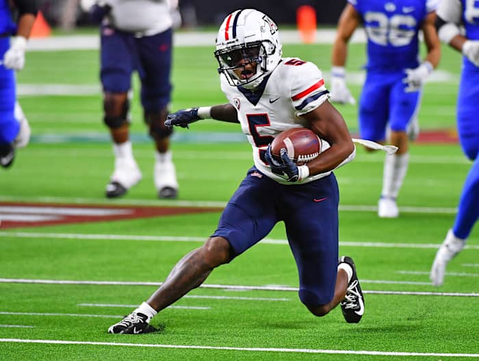 Arizona wide receiver BJ Casteel (5) jukes a defender.