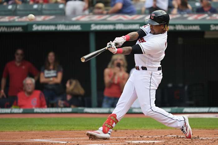 Sep 17, 2022; Cleveland, Ohio, USA; Cleveland Guardians third baseman Jose Ramirez (11) hits a home run during the first inning against the Minnesota Twins at Progressive Field. Mandatory Credit: Ken Blaze-USA TODAY Sports