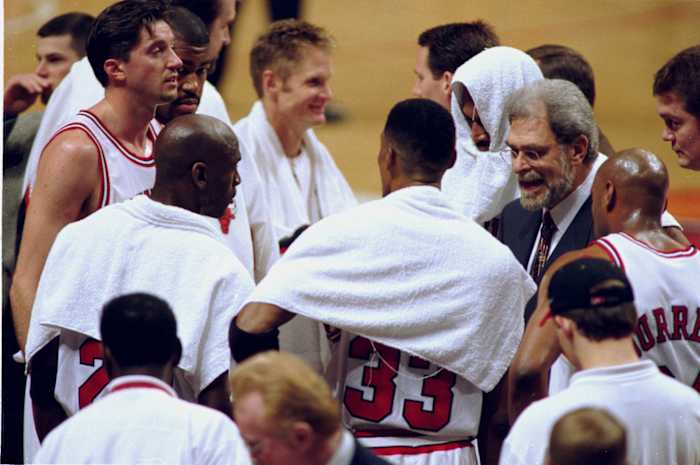 April 8, 1998; Chicago Bulls coach Phil Jackson with Scott Burrell Scottie Pippen, Michael Jordan, Toni Kukoc, Dickey Simpkins, Steve Kerr and Dennis Rodman