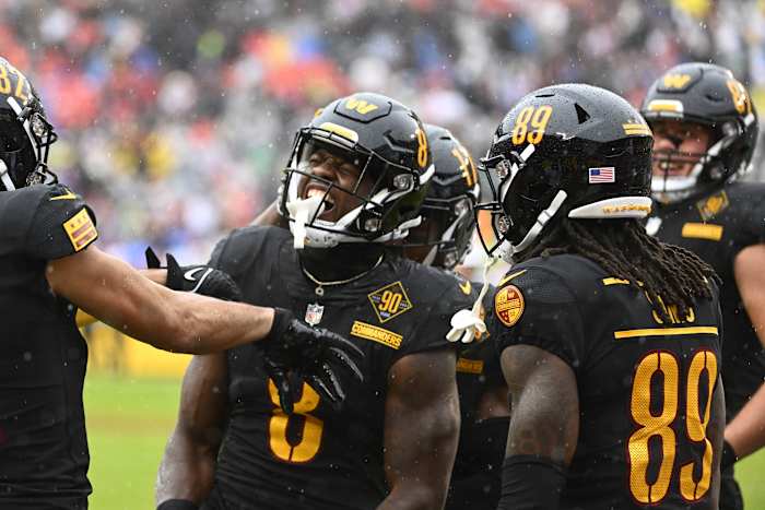 Commanders running back Brian Robinson Jr. celebrates after scoring a touchdown in his team’s win over the Falcons in Week 12.