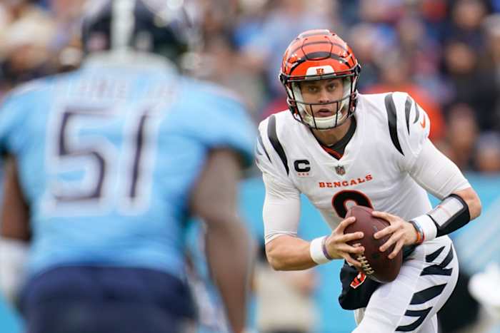 Cincinnati Bengals quarterback Joe Burrow (9) looks for an opening to pass as they face the Tennessee Titans during the second quarter at Nissan Stadium Sunday, Nov. 27, 2022, in Nashville, Tenn. Nfl Cincinnati Bengals At Tennessee Titans
