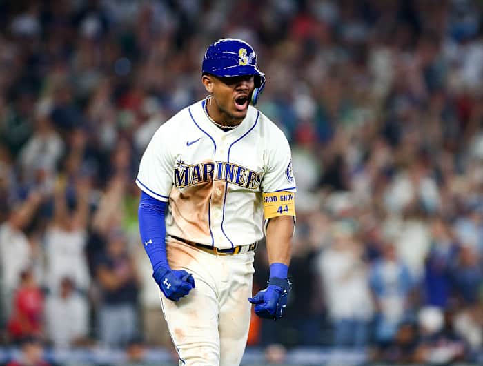 Mariners center fielder Julio Rodríguez celebrates after hitting a game-tying home run.