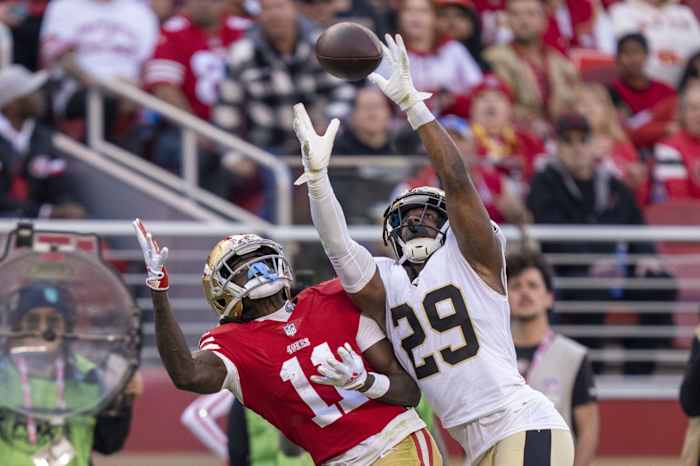 New Orleans Saints cornerback Paulson Adebo (29) deflects a pass intended for San Francisco 49ers wide receiver Brandon Aiyuk (11). Mandatory Credit: Kyle Terada-USA TODAY Sports