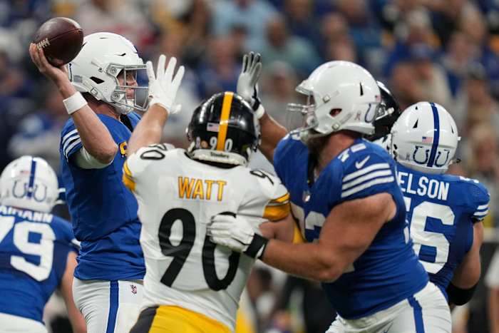 Pittsburgh Steelers linebacker T.J. Watt (90) pressures Indianapolis Colts quarterback Matt Ryan (2) as he draws back to pass Monday, Nov. 28, 2022, during a game against the Pittsburgh Steelers at Lucas Oil Stadium in Indianapolis.