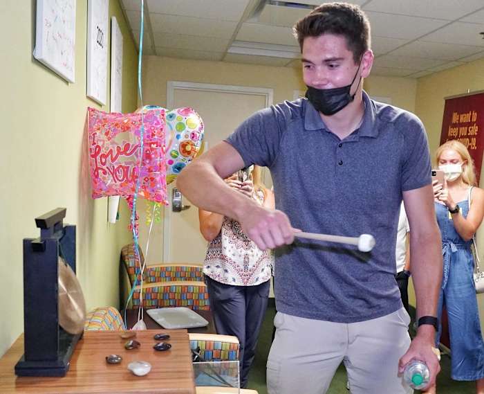 Will Francis rings the bell at Fairview Masonic Children’s Hospital.